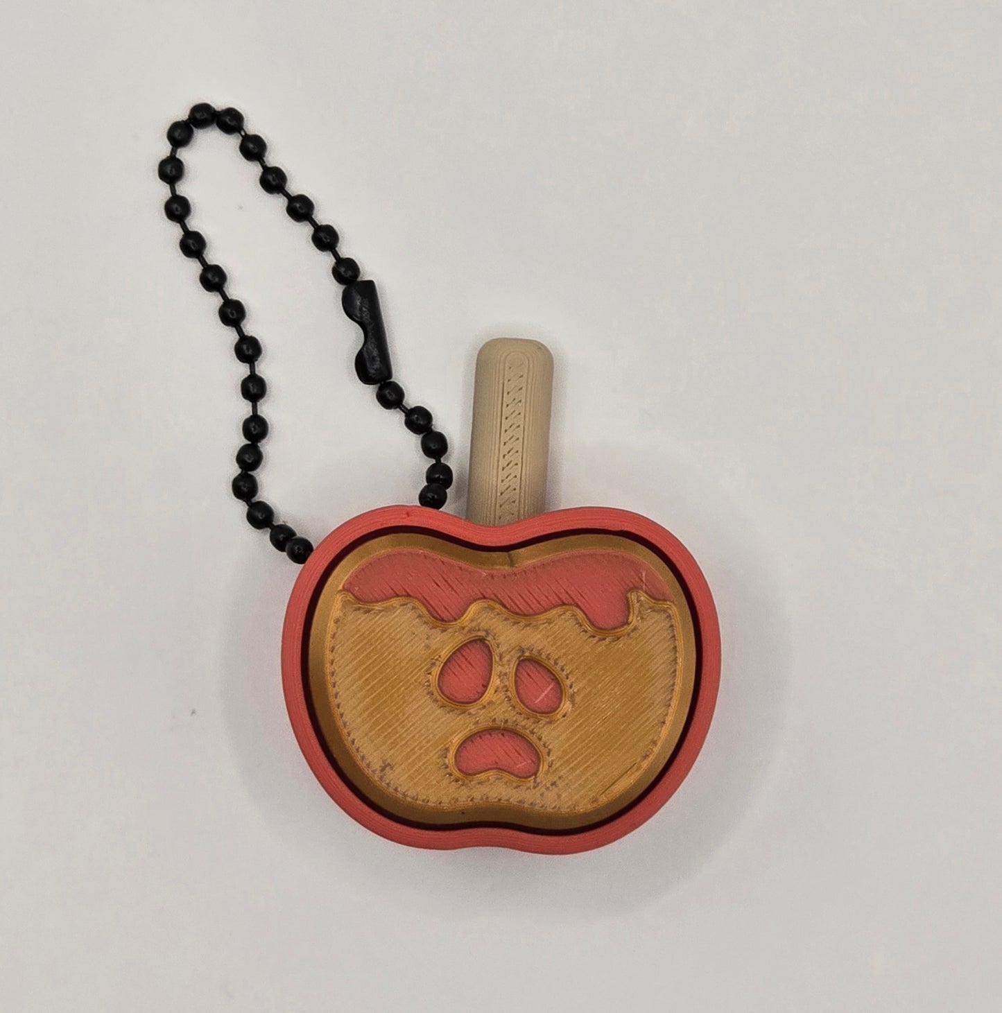 Caramel Apple Clicker Fidget Keychain β Halloween Fidget Toy β 3D Printed Spooky Apple Keychain by Cubed Dimensions Printing