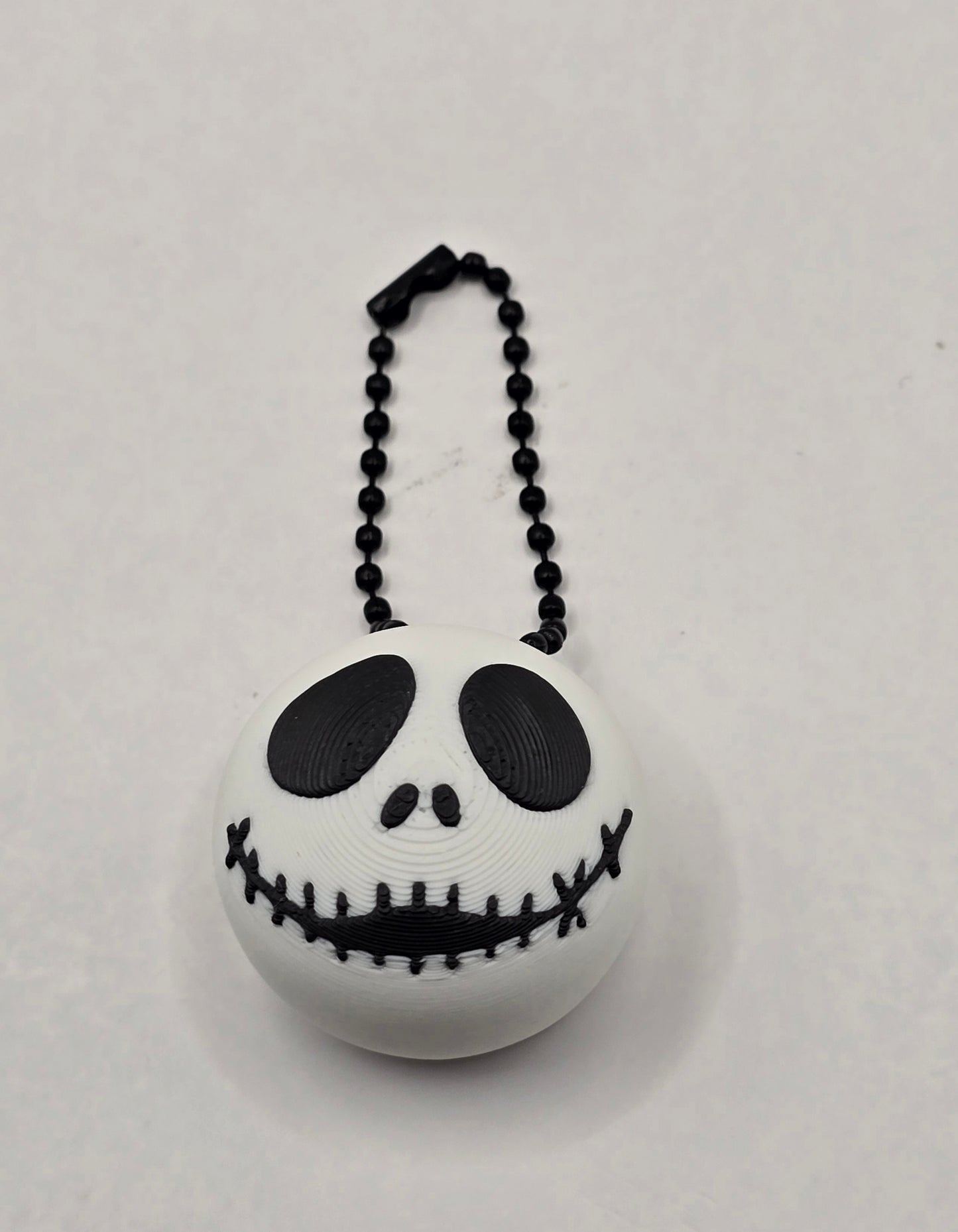 Jack-Inspired Skull Clicker Fidget Keychain | 3D Printed Stress Relief Toy by Cubed Dimensions Printing