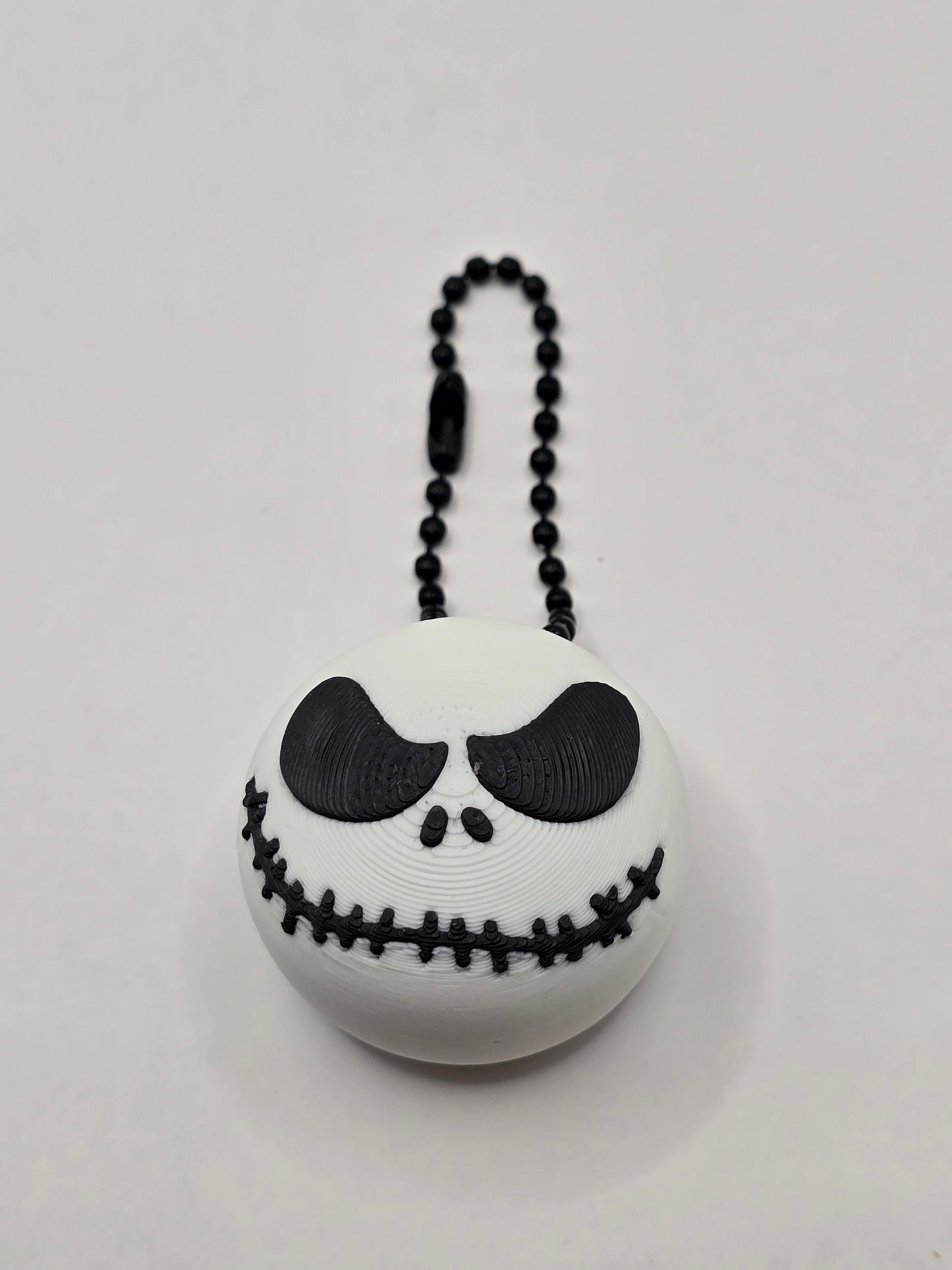 Jack-Inspired Skull Clicker Fidget Keychain | 3D Printed Stress Relief Toy by Cubed Dimensions Printing